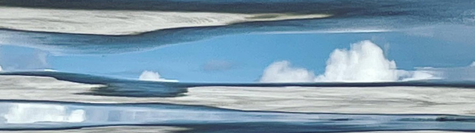 clouds reflecting in water